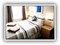 (Room 11) Double room at the front of the property located on the second floor, full shower en-suite.Panoramic foreshore and sea views.